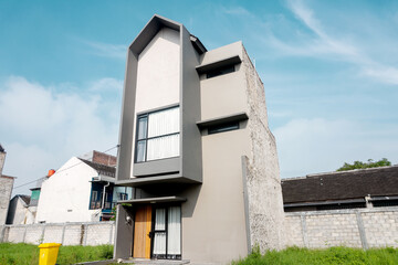 Terraced family homes in newly developed housing estate. Residential homes with modern facade.	