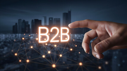 B2B: Businessman hand touching a glowing B2B hologram, Business-to-business (B2B) digital business models concept, B2B Marketing Management in the Web.