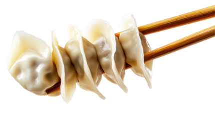 A close-up of dumplings held with chopsticks, showcasing a popular Asian dish.