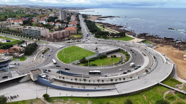 Aerial View Of Matosinhos City, Portugal and of a large circular road on the coast of Porto.