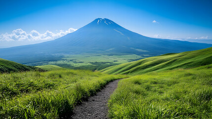 Fototapeta premium Hiking Through Lush Green Grasslands Towards Majestic Mountain Peak