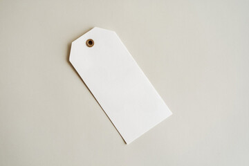 White clothing hang tag mockup blank paper cardboard price label tag with rope with sopy space