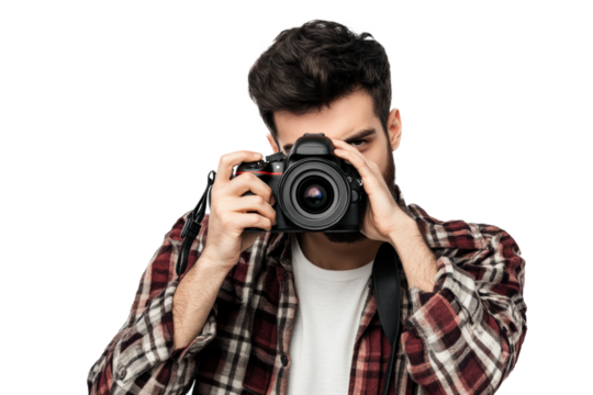 A male photographer in a casual outfit with a camera strap around his neck, holding a DSLR camera up to his eye as if taking a picture.