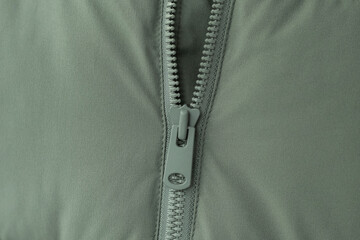 Close-up photo of a zipper on a jacket © Dmitri Krasovski