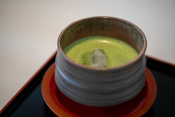 A warm cup of matcha is made of finely ground green tea powder. It's widespread in Japanese culture