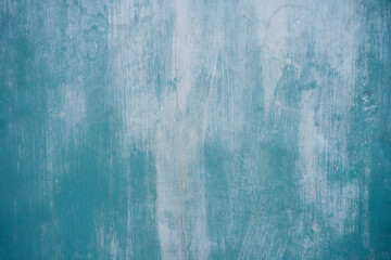 Old wooden blue marble door on the 14th century Basilica of Santa Maria Novella, Florence, Italy. Close up texture and background.