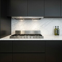 modern kitchen with black cabinets, marble countertops, and a sleek stainless steel range hood