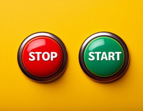 A bright red "STOP" button and a green "START" button are located next to each other on a yellow background.