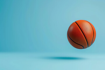Fototapeta premium Floating Basketball on Blue Background 