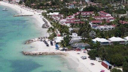 Aerial View Over Beach With White Sand In Dickenson Bay, Antigua Barbuda - Drone Shot