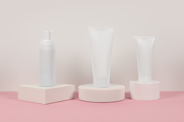 White plastic tubes without label displayed on podium. Scene for advertising cosmetics base