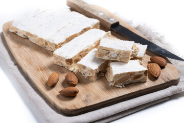 Christmas almond nougat isolated on white background.