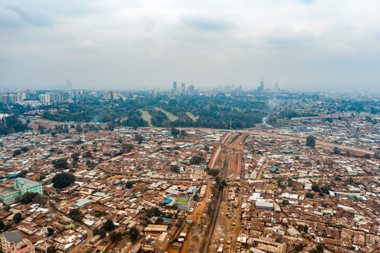 Aerial view of dense urban landscape with buildings and roads in Kibera slum, Nairobi, Kenya.