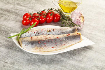 Marinated herring fillet with green onion
