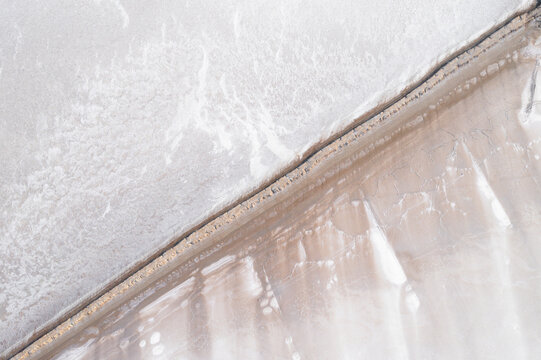Aerial view of beautiful salt farm with intricate textures and patterns, Dazkiri, Turkey.