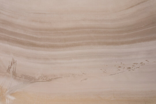 Aerial view of abstract patterns and textures of a serene salt farm, Dazkiri, Turkey.