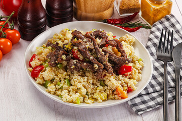 Traditional couscous with beef and vegetables