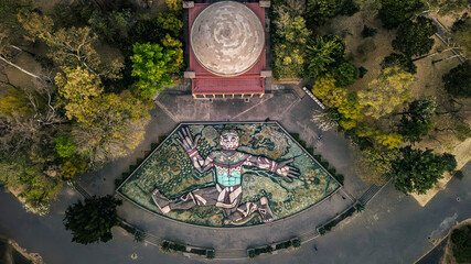 Aerial view of Carcamo de Dolores with beautiful mural and historic architecture surrounded by greenery, Miguel Hidalgo, Mexico.