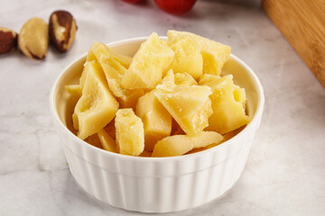 Crushed parmesan cheese in the bowl