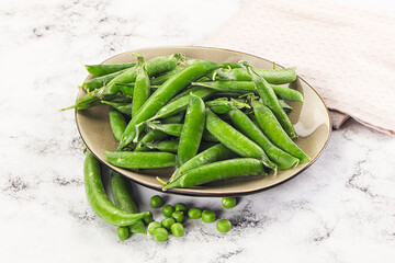 Sweet young green peas heap