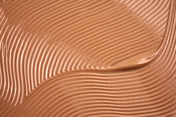 Lliquid foundation makeup cream texture background