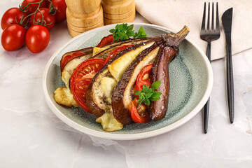 Baked tomato with mozzarella and tomato