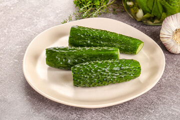 Homemade lighty salted cucumbers with herbs