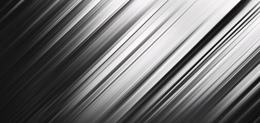 Obraz premium Abstract grayscale background featuring smooth, flowing diagonal lines creating a dynamic sense of movement and depth.