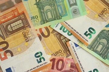Many euro money bills. Lot of banknotes of european union currency close up