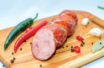 Tasty sausages and vegetables isolated over solid background