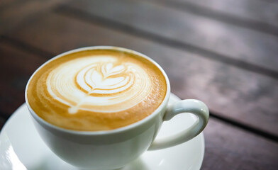 Latte Coffee on a Wooden Table A Warm Morning Moment