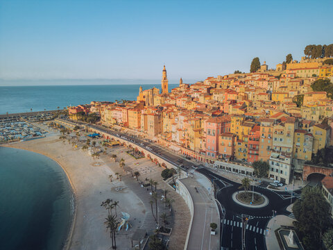 Aerial view of menton old town with colorful pastel houses and scenic beach at sunset, Saint-Paul-Garavan, France.