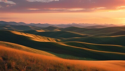 Rolling Hills Bathed in the Golden Glow of Twilight with a Softly Lit Sky