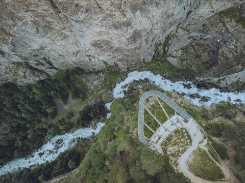 Aerial view of the beautiful Orrido di Pre-Saint-Didier with a river, rugged cliffs, and lush forests, Pre-Saint-Didier, Italy.