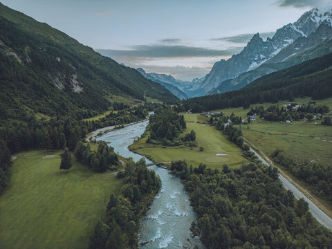 Aerial view of the beautiful Val Ferret with majestic Mont Blanc and serene Dora di Ferret, Courmayeur, Italy.
