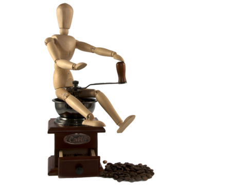 wooden puppet sitting on coffee machine png file