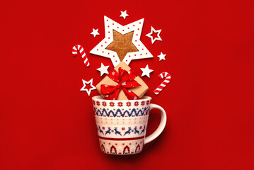 Christmas coffee mug with christmas ornaments. Christmas concept background