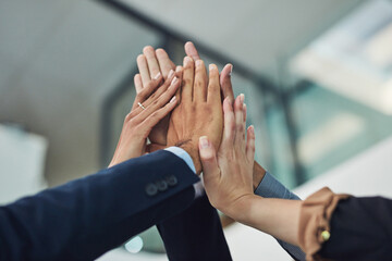 Victory, hands or business people high five in meeting in celebration of success, goal or achievement. Group, sales target or staff in office huddle for teamwork, job promotion or corporate project