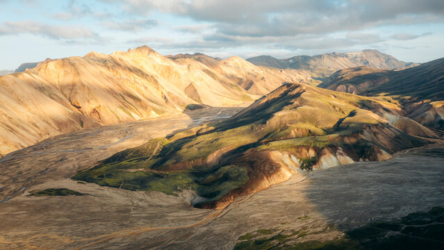 Aerial view of majestic Landmannalaugar mountains and serene valleys with rugged terrain, Rangarping Ytra, Iceland.