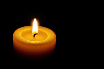 Small Flame. Dark Background with Burning Candlelight for Church Celebration