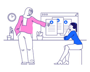 Two female recruiters discuss job candidates