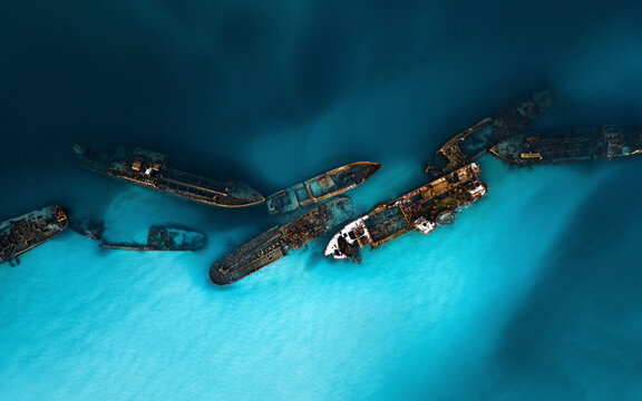 Aerial view of tangalooma wrecks and serene blue ocean, Moreton Island, Australia.