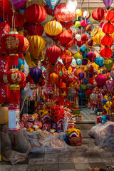 Decorated colorful lanterns hanging on a stand in the streets in Hang Ma street, Ha Noi city, Vietnam during Mid Autumn Festival.