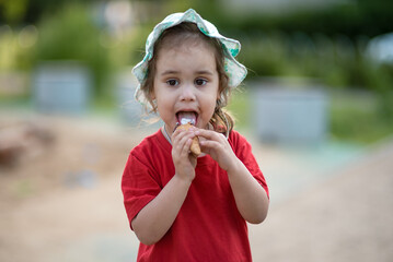 Close-up portrait of a child with ice cream