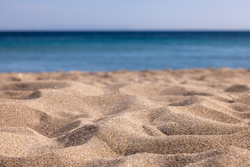 Beach, sea and sky. Close-up of beach and sand, blue sea and sky, empty ground, no people. Suitable for product placement. For manipulation and photomontage