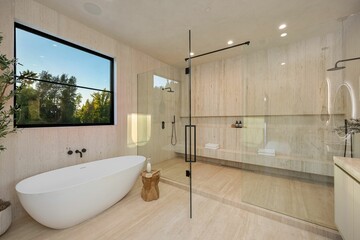 Modern luxurious bathroom with a freestanding tub.
