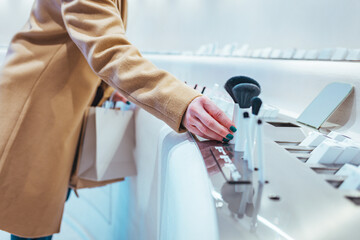 Woman Shopping For Cosmetics In Elegant Store
