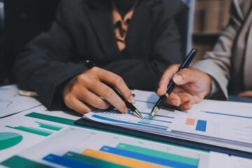 Team of business people are meeting to analyze data for marketing plan,Market research reports and income statistics, Financial and Accounting concept.