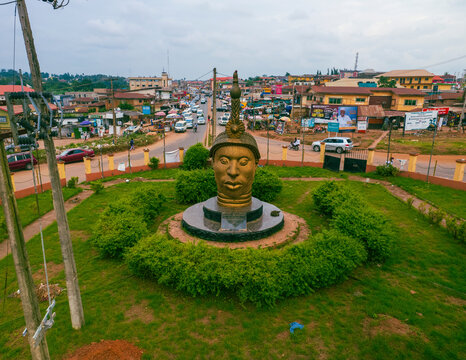 Ife, Nigeria - 27 July 2024: Aerial view of ife roundabout with vibrant traffic and greenery, ife, nigeria.