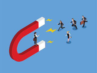 Businesswoman with magnet Drawing the team together